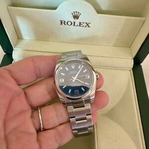 Rolex Silver Watch with Blue Dial